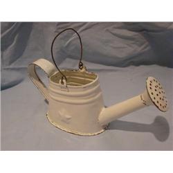 White enamel watering can