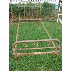Single size brass bed with rails