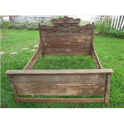 Carved bed w/wood rails