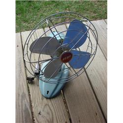 Blue vintage metal oscillating fan