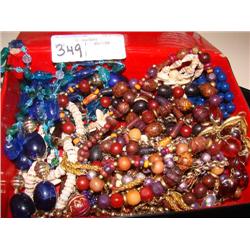 Large box of beaded necklaces