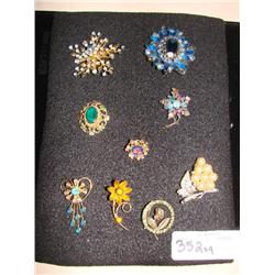 9 rhinestone brooches