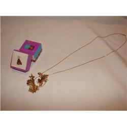 14 kt. Gold neckchain w/charms