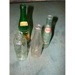 4 old soda bottles