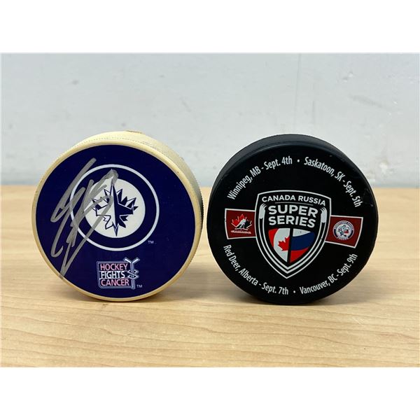 Autographed Winnipeg Jets Hockey Puck & Canada / Russia Super Series Puck