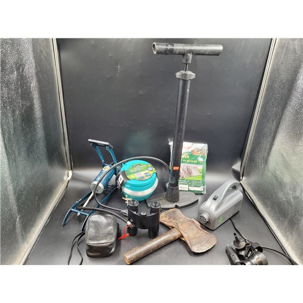Air Pump, Binoculars, Water Container, Axe Head, and Emergency Shelter
