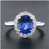 Image 2 : 14k White Gold 2.60 ctw Violet Blue Oval Tanzanite w/ Round Diamond Halo Ring