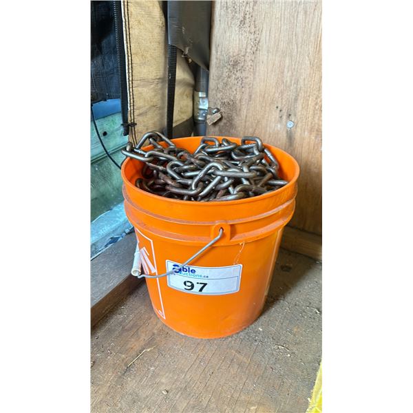 ORANGE BUCKET FILLED WITH APPROX. 100' OF CHAIN