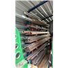 Image 1 : WALL MOUNT STEEL MATERIAL RACK WITH LARGE ASSORTMENT OF STEEL LENGTHS - ANGLE IRON, FLATBAR, SQUARE