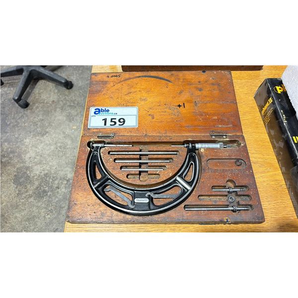 STARRETT 2" - 6" MICROMETER IN A WOODEN CASE