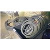 Image 1 : GROUP OF 7 HEAVY GAUGE BLACK WATERLINE HOSES & BLACK PLASTIC TROUGH ON A PALLET