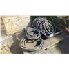 Image 2 : GROUP OF 7 HEAVY GAUGE BLACK WATERLINE HOSES & BLACK PLASTIC TROUGH ON A PALLET