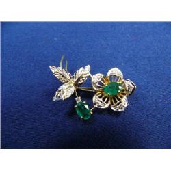 Emerald and diamond brooch, 14K yellow gold, emeralds: oval, faceted, approx. .75 carats, semi-trans