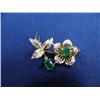 Image 1 : Emerald and diamond brooch, 14K yellow gold, emeralds: oval, faceted, approx. .75 carats, semi-trans