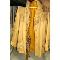 Beautiful tan deer skin coat with fringe and deer antler buttons and 3 hand carved wood fish on stri