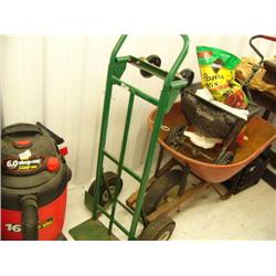 Shop vac, 2 wheeled hand truck, wheelbarrow and fertilizer spreader (241)