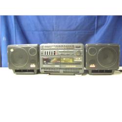 Mega power dual cassette with auto reverse and surround sound