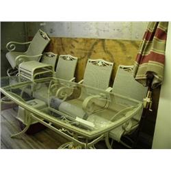 two tables, umbrella, 2 foot stools, and 6 chairs (241)