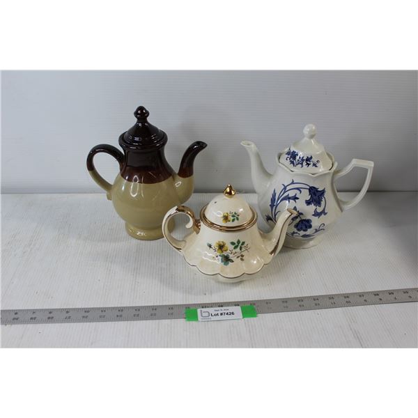 (3) Teapots