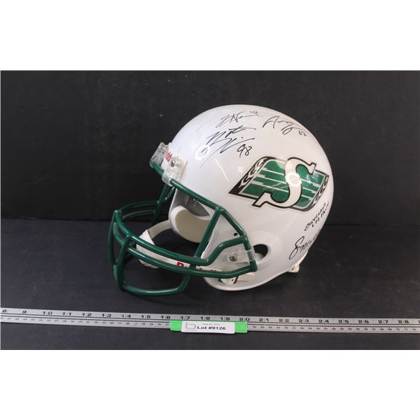 *Saskatchewan Roughriders Helmet 2002 - Signed: # 20, 74, 67, 89, 42, 68, 98, 72, 60, 20, ?)