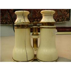 Set of ivory binoculars, from Paris, made by: "Malcrida Rue Vivenne 12 Paris."  5" long, elephant iv