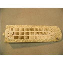 Elephant ivory cribbage board with beautiful oriental design, has pegs, 8" long (3)