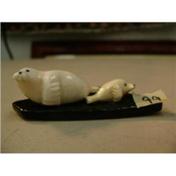 Pair of ivory seals mounted on baleen Robert Apatiki (3)