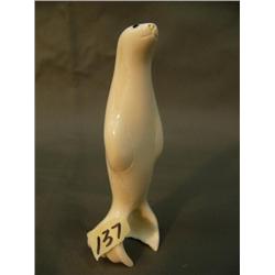 Unusual 3.75" ivory seal standing on flippers very rare, inset baleen eyes, high quality (3)