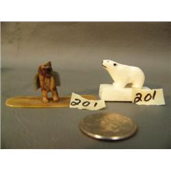 1.5 in. high ivory bears mounted on ivory bases