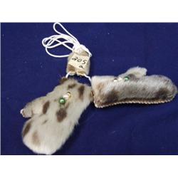 Sealskin mitten yo-yos by Maria Anariak