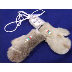 Sealskin mitten yo-yos by Maria Anariak