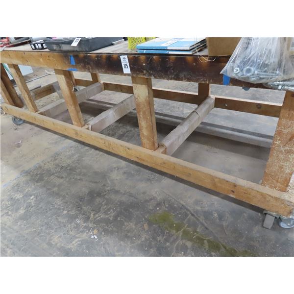 Wooden Approx.  3'  X  10'  Rolling Work Table