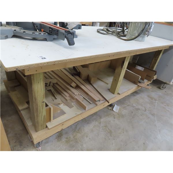 Approx  4'  X  8'  Rolling Table w/Wood Cuts