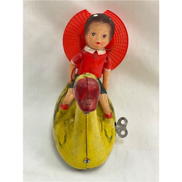 Vintage Tin Litho Wind Up Child Riding Swan