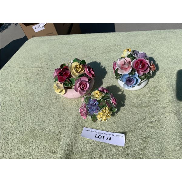 Three Porcelain Decorative Floral Arrangements
