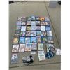 Image 1 : Variety of DVD'S & Entertainment System w Two Remote Controls