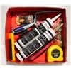 Image 1 : TOOLS & BLACK SILICONE