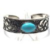 Image 1 : 10)  SILVER TONE WITH OVAL TURQUOISE STONE SET ON