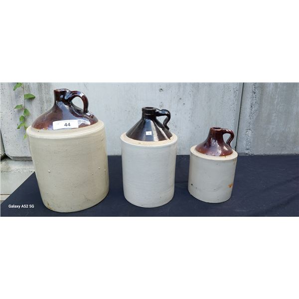 3 antique crock whiskey jugs, nice condition