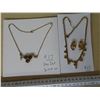 Vandell and yellow tone rhinestone necklaces/earrings