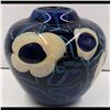 Image 2 : Heavy Cased Art Glass Vase With A Deep Blue Background
