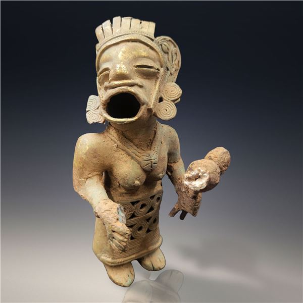 A Tairona Female Shaman Figure With Instruments