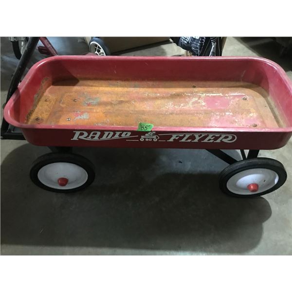 Radio Flyer Wagon has all hubcaps and graphics