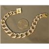 Image 1 : 7.5" 14K gold tennis bracelet 108 small diamonds. .8 oz total weight (241)