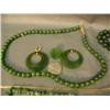 Image 2 : Lot of jade jewelry: apple on gold chain; jade bead necklace, 4"; 20" jade necklace; chunk jade neck