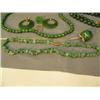 Image 4 : Lot of jade jewelry: apple on gold chain; jade bead necklace, 4"; 20" jade necklace; chunk jade neck
