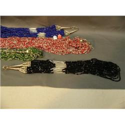 Lot of four beaded necklaces with silver findings (241)