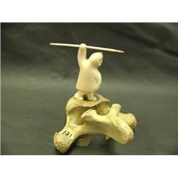 Simon Pushruk ivory hunter mounted on whale vertebrae (3)