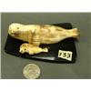 Image 2 : Pr. Of fossilized ivory seals - mother is 4.25, baby is 1.5 by Robert Apatiki, largest ones by this 