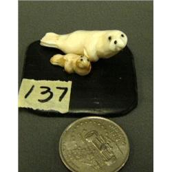 Pair of ivory seals, mother is 2", baby is .75" by Robert Apatiki (3)